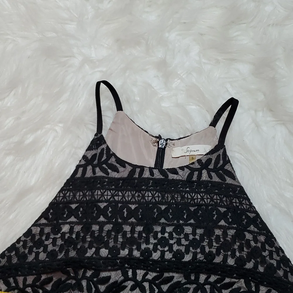 Soprano black with cream underlayer size small in like NEW condition
